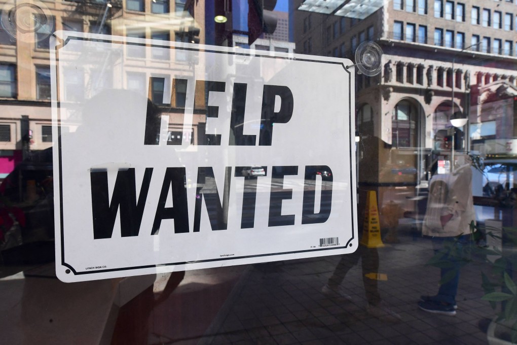 A “help wanted” sign in a restaurant window in Los Angeles, California. US unemployment could fall below 3 per cent this year. The last time that happened, in the 1950s, a recession in which many workers lost their jobs followed. Photo: AFP