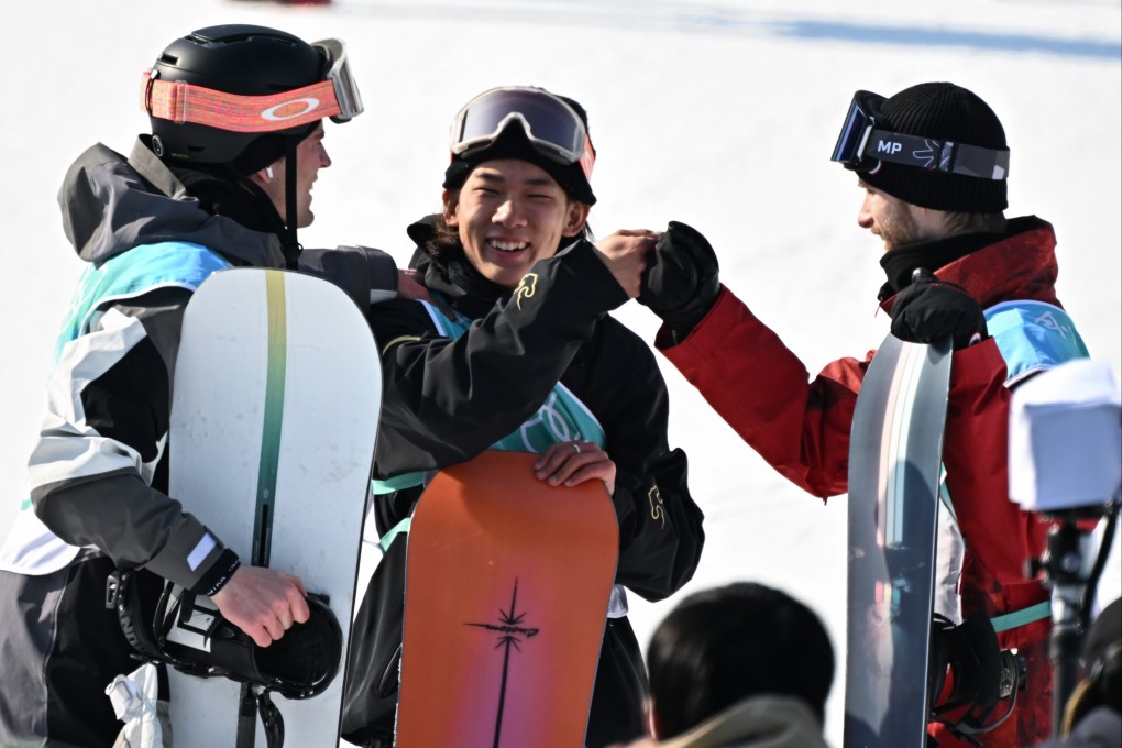 China’s Su Yiming is congratulated by fellow snowboarders after winning gold in the men’s big air event at the Winter Olympics. Photo: Xinhua