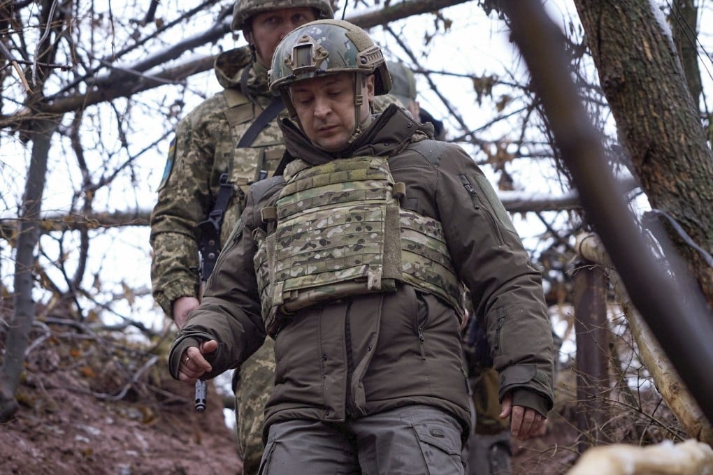 Ukrainian President Volodymyr Zelensky visiting positions on the frontline with pro-Russian militants in the Donetsk region, Ukraine, in December. Photo: EPA
