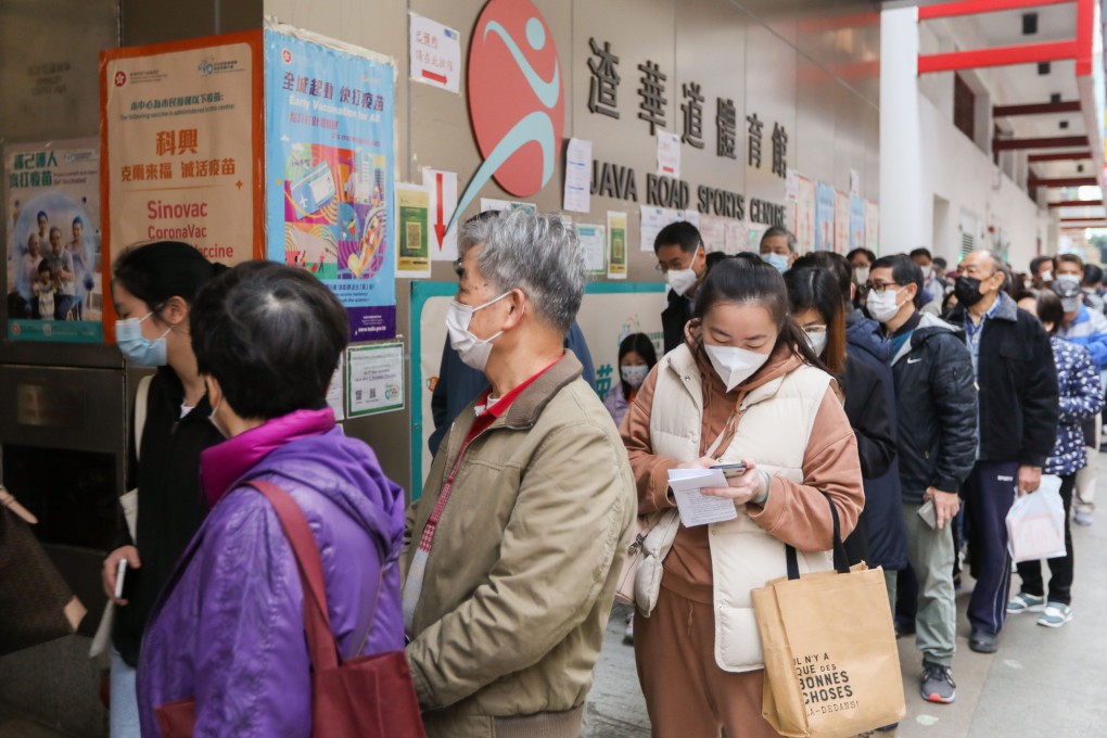 People queue up to receive coronavirus vaccines on Tuesday morning. Photo: Yik Yeung-man