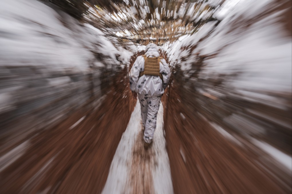 A Ukrainian serviceman walks in a trench at a frontline position in the Donetsk region, eastern Ukraine. Photo: AP