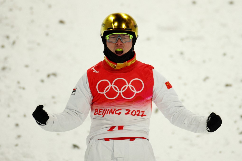 Qi Guangpu of China celebrates after his run in men’s aerial qualification at the Beijing 2022 Winter Olympics. Photo: Reuetrs