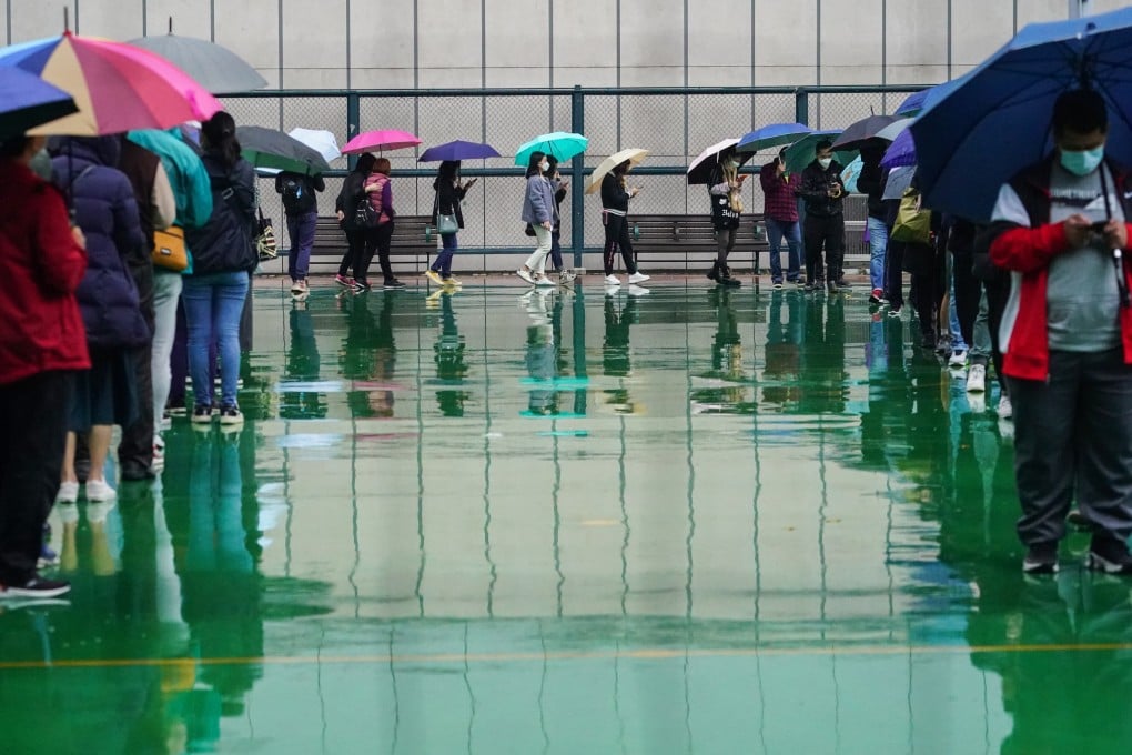 Local residents queue up for Covid-19 testing at a mobile specimen collection station. Photo: Felix Wong
