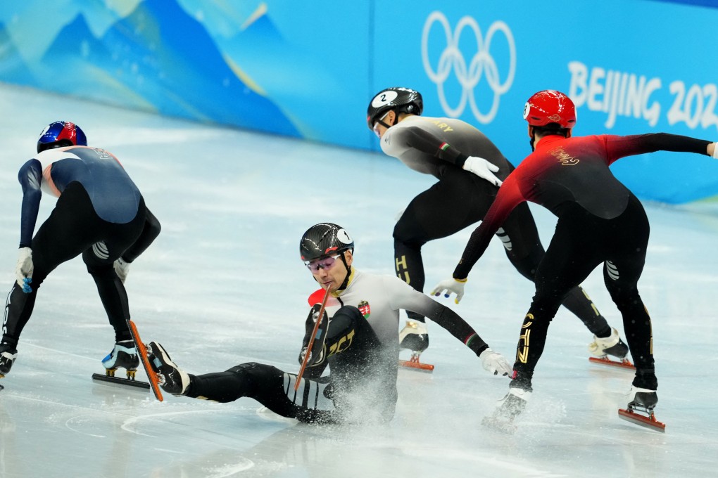 China’s Ren Ziwei, Shaolin Sandor Liu of Hungary and Lee June-seo of South Korea in action as Shaoang Liu of Hungary falls during the men’s 1,000m race.