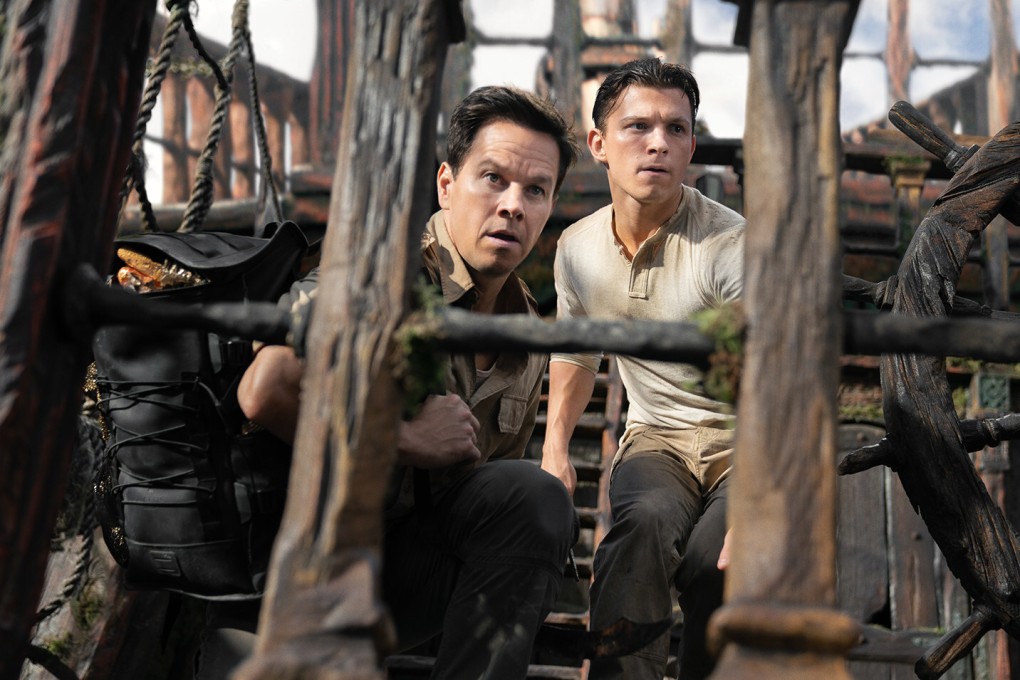 Mark Wahlberg (left) and Tom Holland in a still from Uncharted. Photo: Clay Enos/Columbia Pictures/TNS
