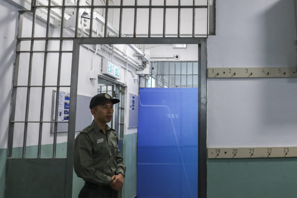 A security guard on duty at Pik Uk Prison in Clear Water Bay. Photo: Dickson Lee