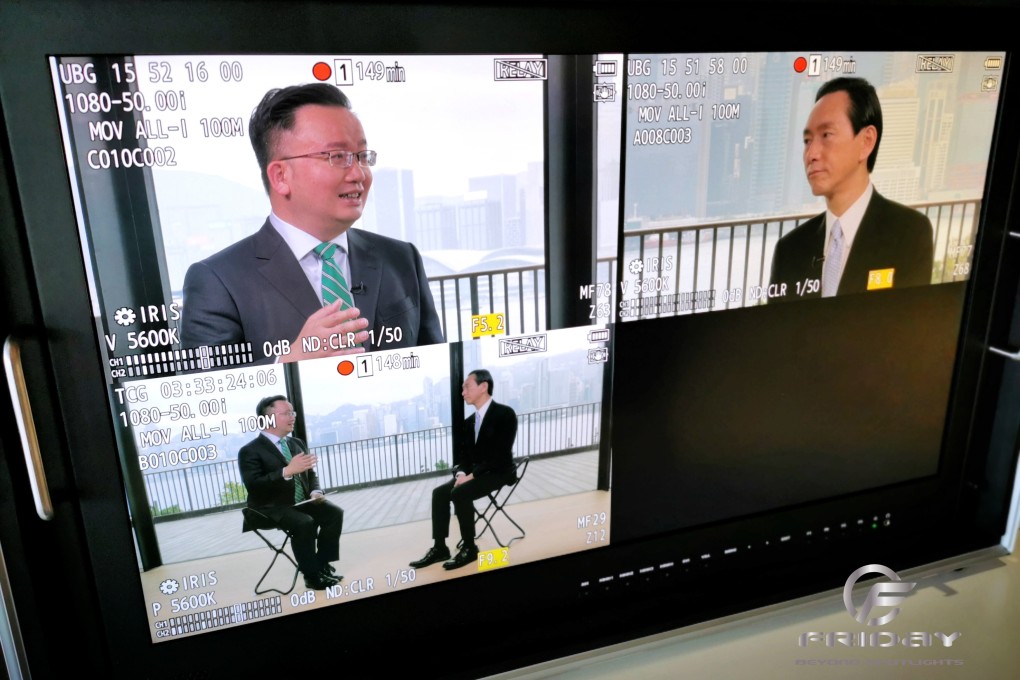 Lawyer and lawmaker Nick Chan Hiu-fung (top left) interviews Hong Kong Executive Council convenor Bernard Chan during the television talk show, ‘Friday Beyond Spotlights’.