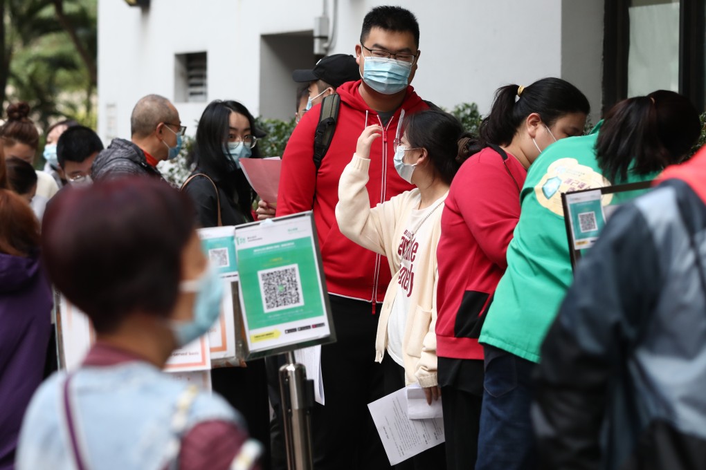 People queue up to receive the Sinovac vaccine at Kwun Chung Sports Centre on 27January 2022. Photo: Jonathan Wong