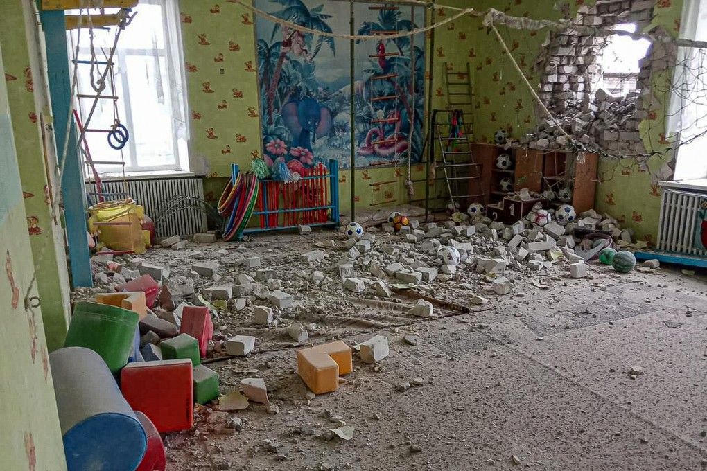 A kindergarten in Stanytsia Luhanska, eastern Ukraine after being shelled on Thursday. Kyiv and the rebels blamed each other for escalating tensions, prompting fears that Russia could get involved. Photo: Joint Forces Operation via AP