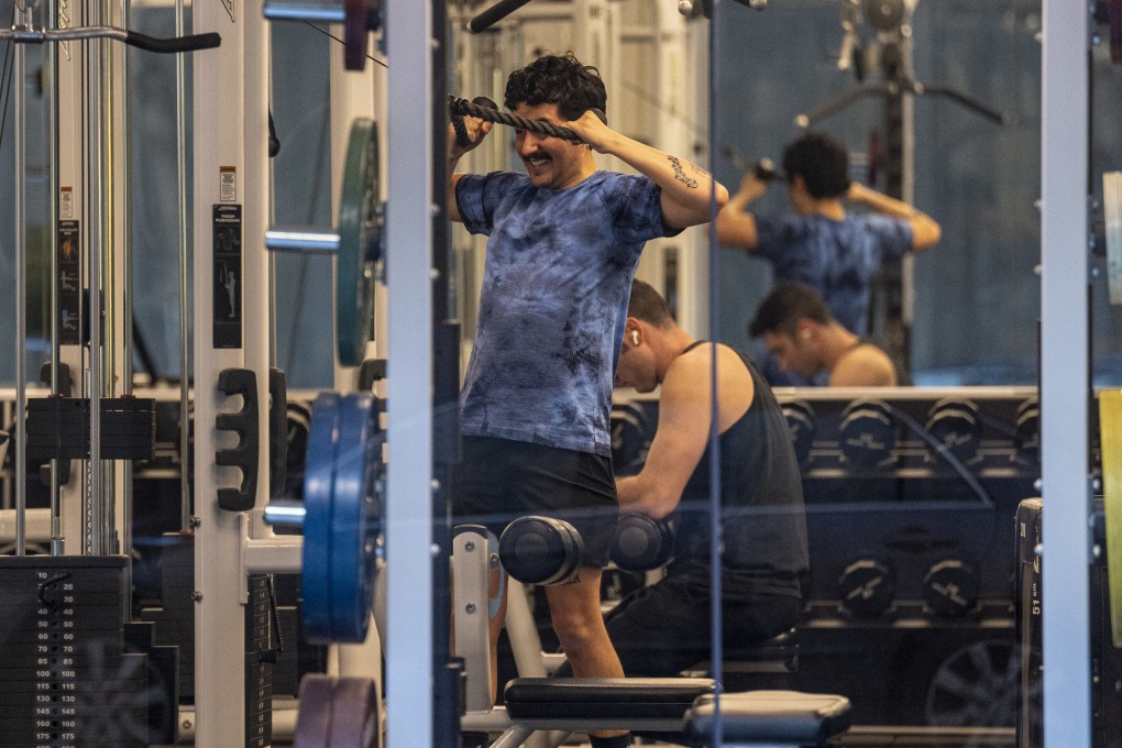 People exercise at a gym in San Francisco, California. The state’s indoor mask requirement, which requires everyone to wear face coverings indoors regardless of vaccination status, expired on Wednesday. Photo: Bloomberg