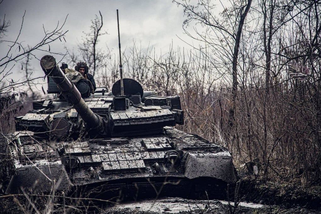 A service member of the Ukrainian Naval Infantry Corps (Marine Corps) rides a tank during drills at a training ground in an unknown location in Ukraine. Photo: Press Service of the Ukrainian Naval Forces/Handout via Reuters