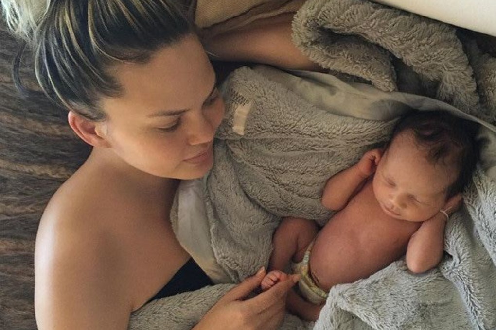 Chrissy Teigen with her first child Luna. A year after her pregnancy loss, she revealed she is trying IVF once again. Photo: Instagram