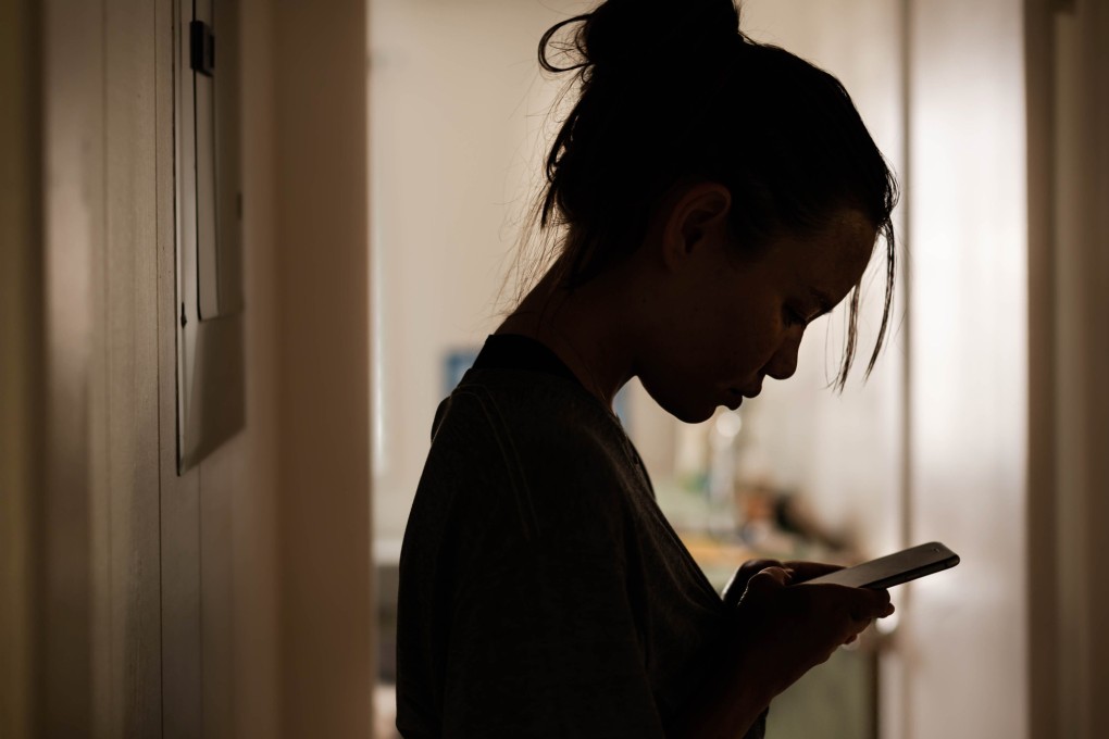 Silhouette of a gloomy girl getting a serious message