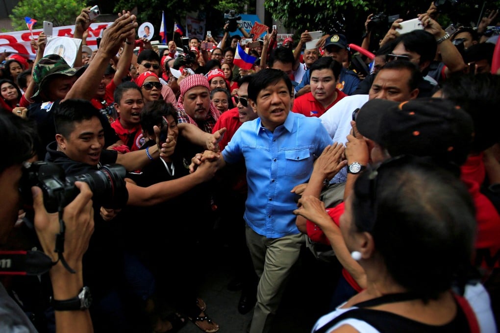 Bongbong Marcos is greeted by supporters. File photo: Reuters