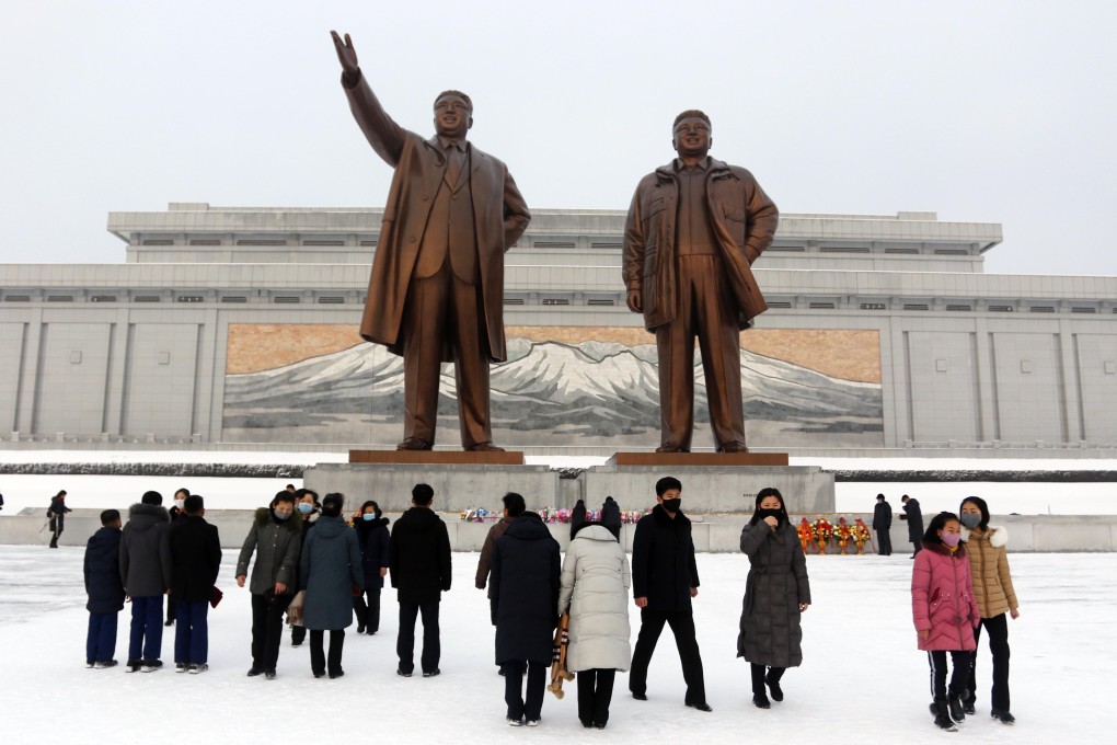 People visit the statues of former leaders Kim Il-sung and Kim Jong-il in Pyongyang earlier this month. North Korea has relied on punishing lockdowns and other restrictions in lieu of vaccines. Photo: AP