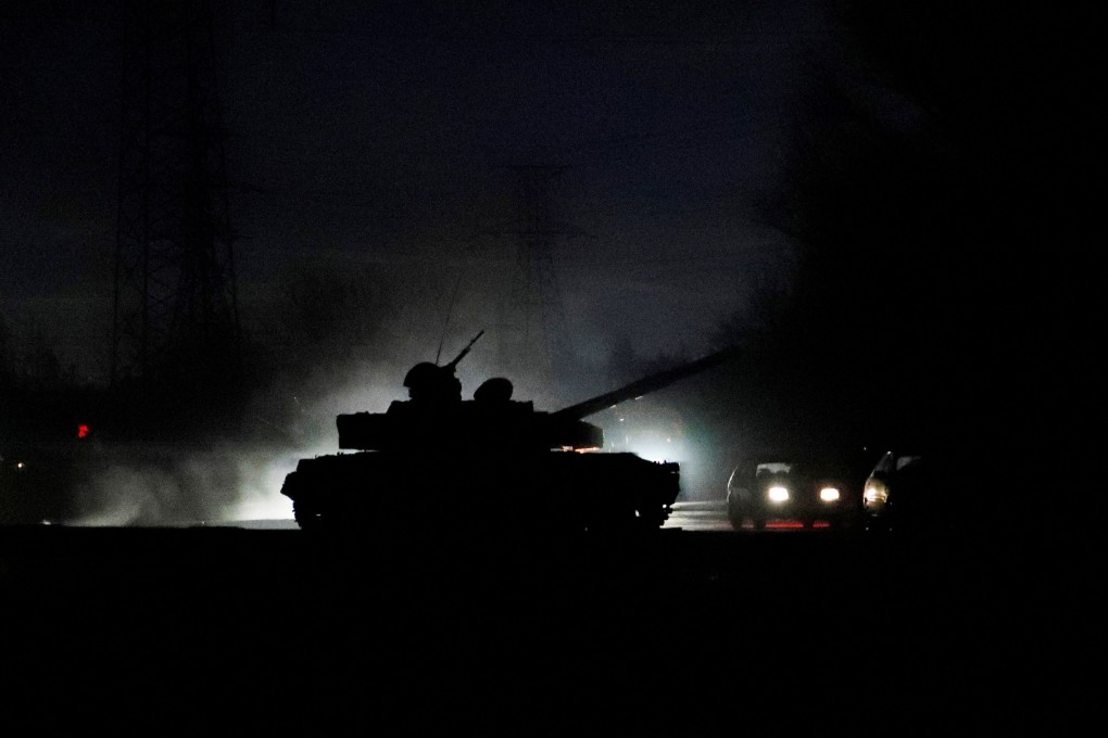 A tank drives along a street after Russian President Vladimir Putin ordered the deployment of Russian troops to two breakaway regions in eastern Ukraine following the recognition of their independence. Photo: Reuters