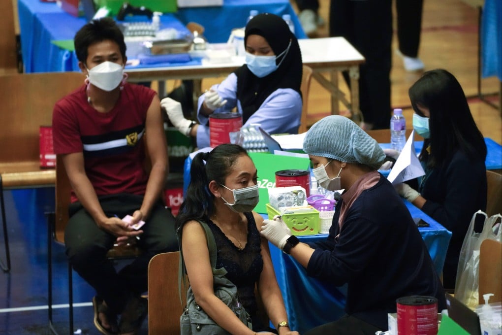 A woman gets vaccinated against Covid-19 in Bangkok, Thailand, on Wednesday. Photo: AP