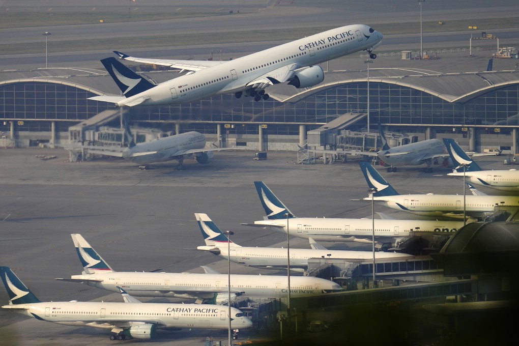 Cathay Pacific airplanes at Hong Kong International Airport. There have been fewer flights out of Hong Kong since the pandemic began. Photo: Sam Tsang