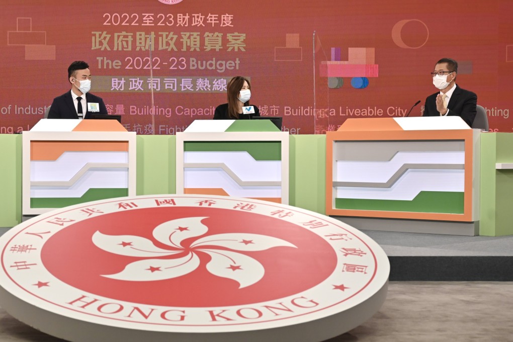Financial Secretary Paul Chan (right) appears on a phone-in radio programme about the 2022-23 budget on Thursday. Photo: Handout