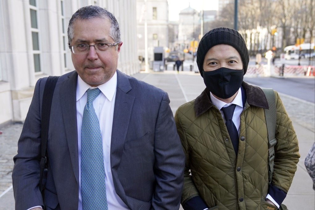 Roger Ng (right) with his lawyer Marc Agnifilo in New York. Photo: AP