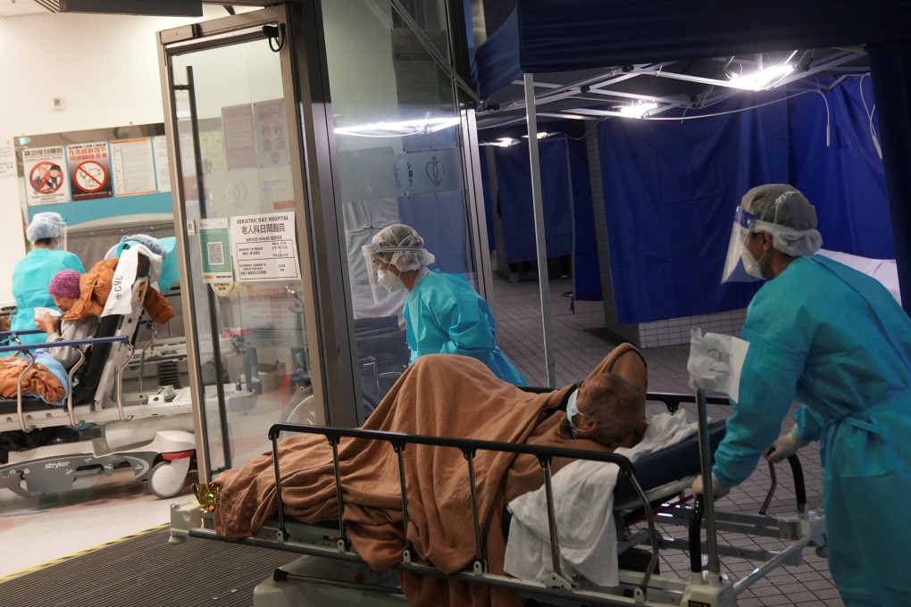 Medical workers move a patient  from a temporary treatment area into a hospital on February 18. Photo: Reuters