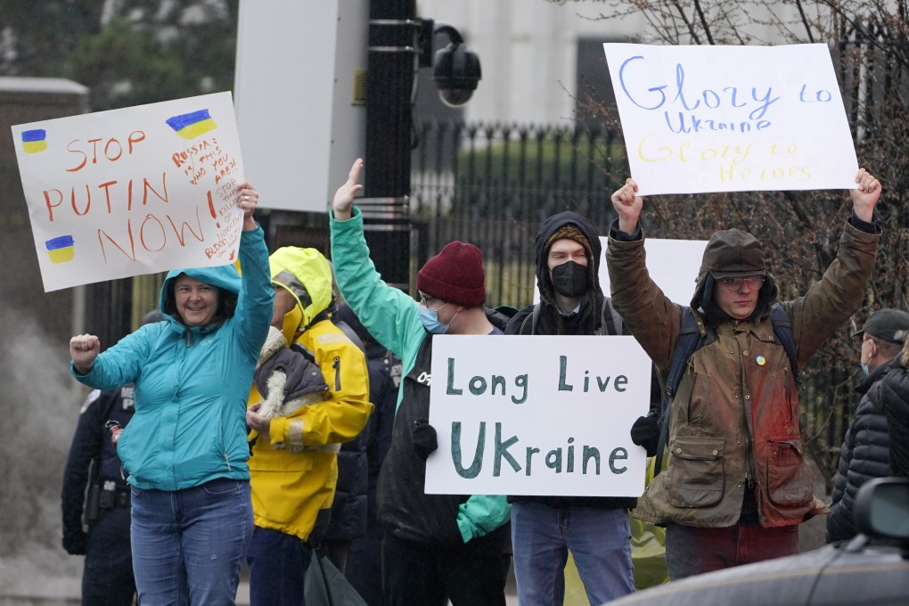 Protesters gather outside the Russian embassy in Washington on Thursday. Photo: AP