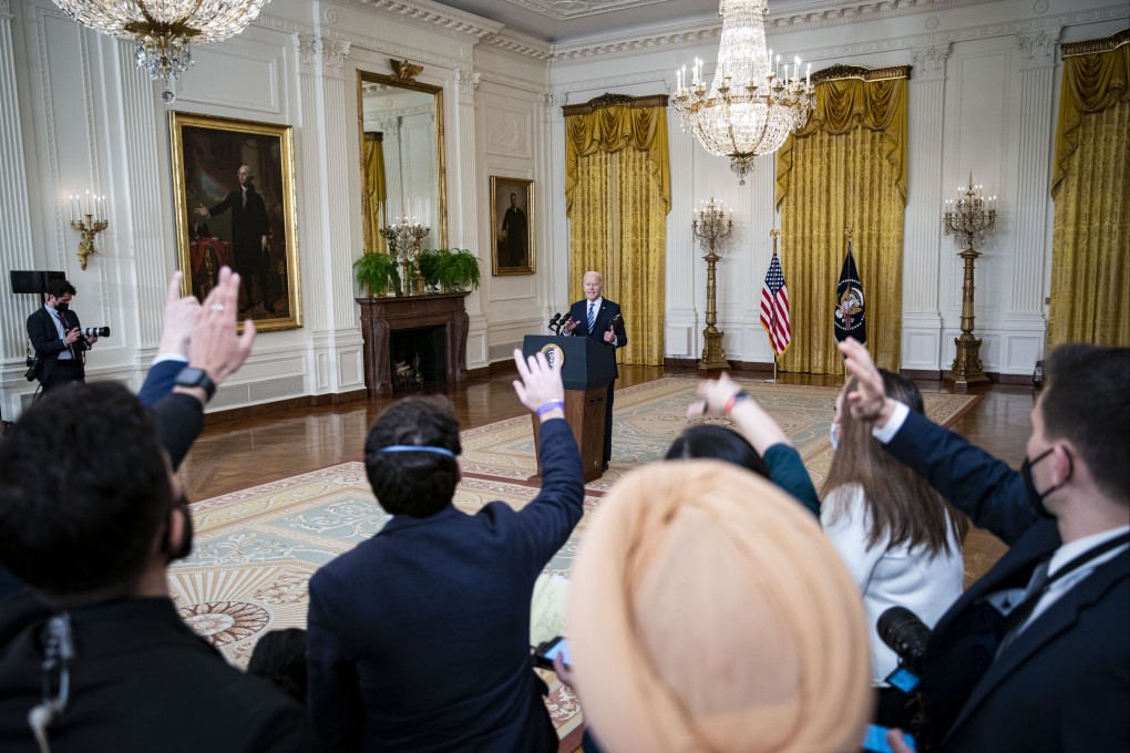 Members of the media raise their hands to ask a question as US President Joe Biden speaks on the Russian invasion of Ukraine on February 24. Photo: Bloomberg