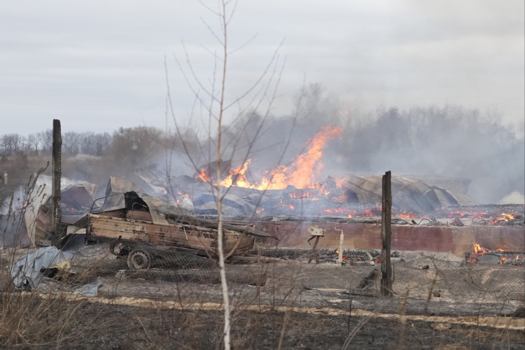 Flame and smoke rise from the debris of a house in the aftermath of Russian shelling outside Kyiv, Ukraine, on Thursday. Photo: AP