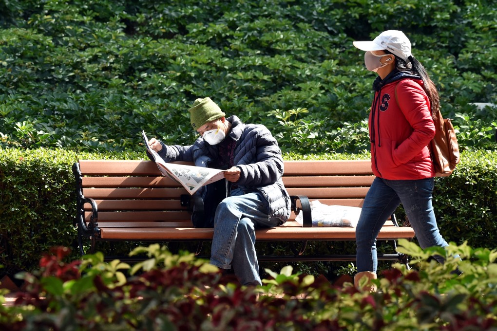People wearing face masks are seen in a park in Hong Kong on Friday. Photo: Xinhua