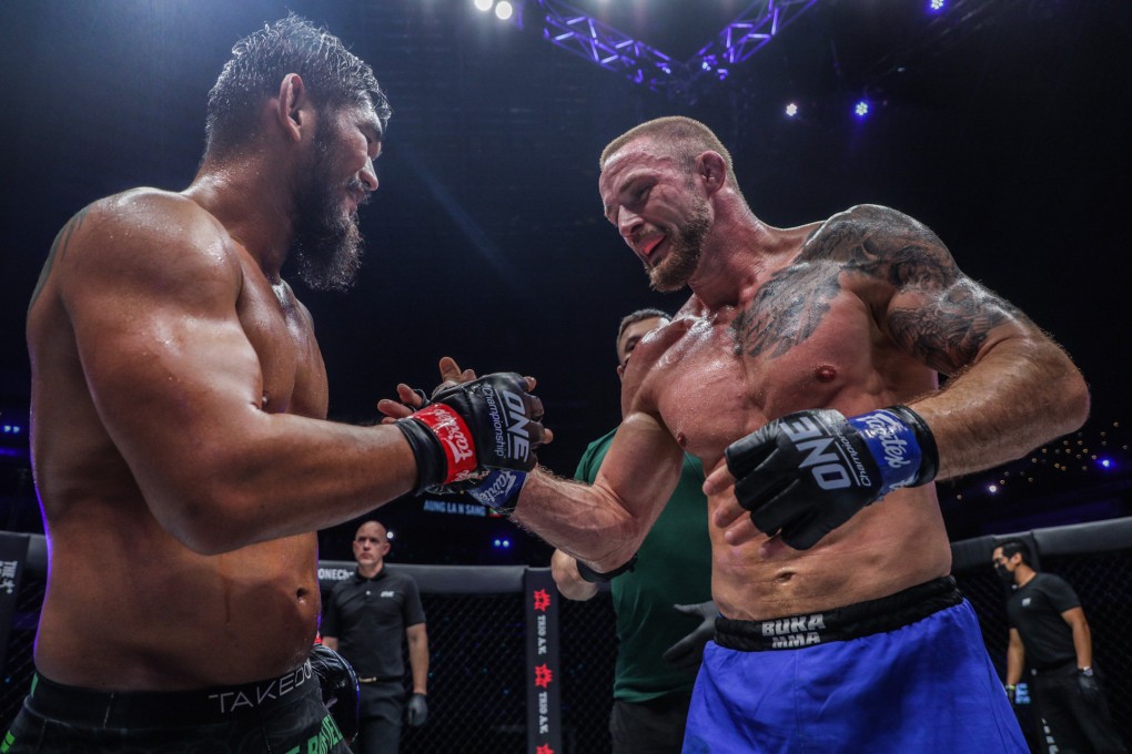 Aung La N Sang (left) and Vitaly Bigdash share a moment of respect after a three-round fight at ONE: Full Circle in Singapore. Photos: ONE Championship.