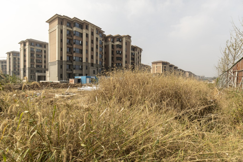 Unfinished apartment buildings at the construction site of China Evergrande Group’s Health Valley development on the outskirts of the Jiangsu provincial capital of Nanjing on Friday, Oct. 22, 2021. Photo: Bloomberg