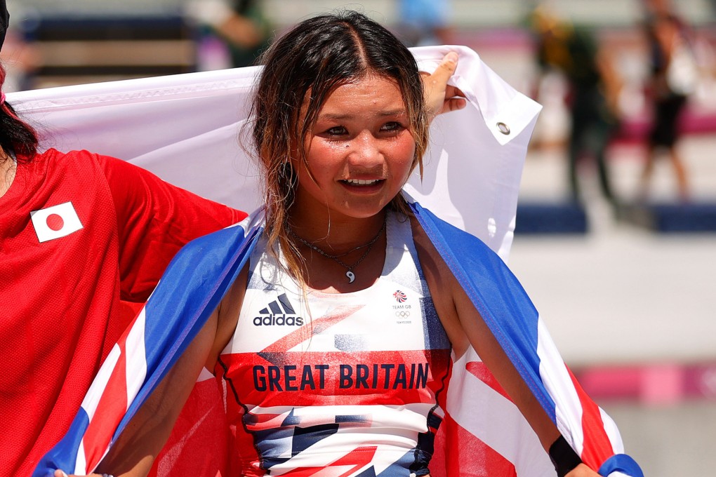 Great Britain’s Sky Brown with Sakura Yosozumi and Kokona Hiraki, of Japan, after the women’s skateboarding park finals at the Tokyo 2020 Olympic Games at the Ariake Urban Sports Park. Photo: Getty Images