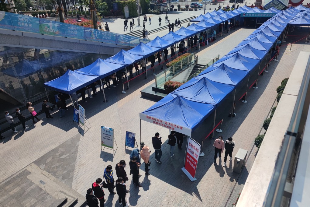 Residents queue up for Covid-19 nucleic acid tests n Shenzhen on Saturday. Photo: Getty Images