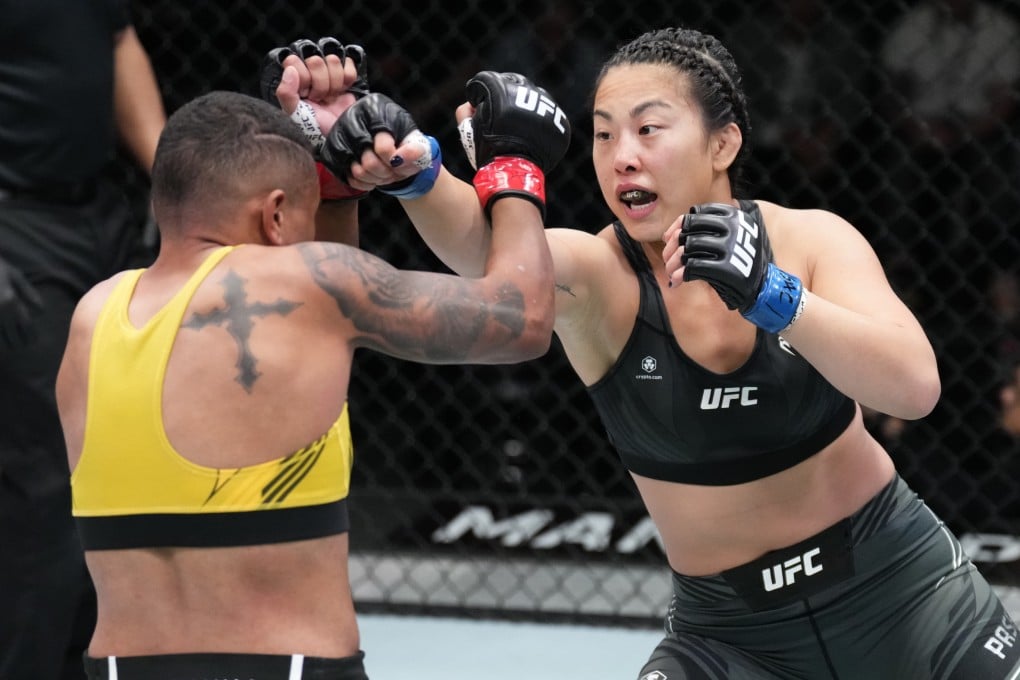 Ramona Pascual punches Josiane Nunes in their featherweight fight at UFC Vegas 49. Photo: Chris Unger/Zuffa LLC