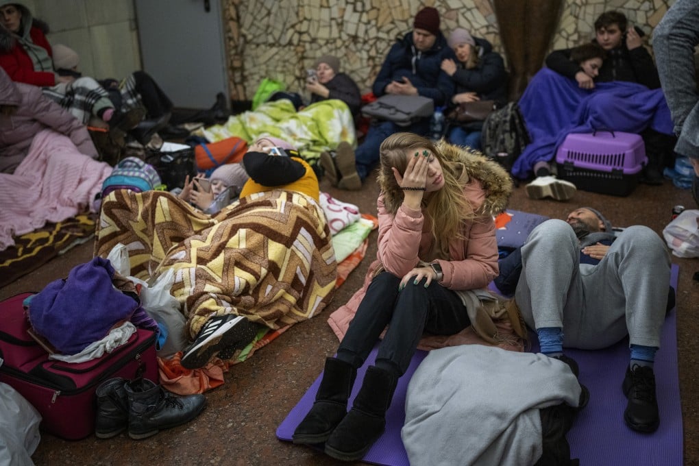 People rest in the Kyiv subway, using it as a bomb shelter. Photo: AP