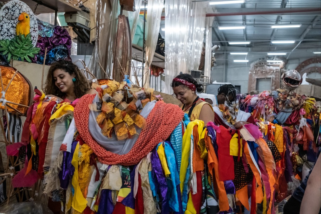 Artisans create costumes for the Grande Rio Samba School, as the Carnival festival is postponed in Rio de Janeiro, Brazil on February 25. Photo: Bloomberg