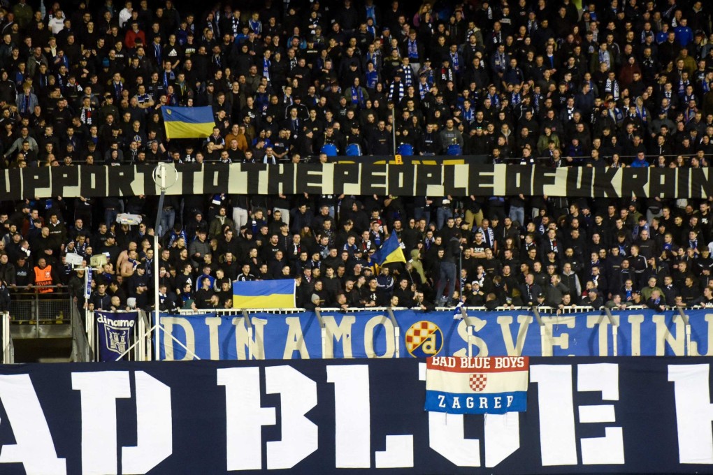 Dinamo Zagreb supporters hold a banner in support of Ukraine during the UEFA Europa League football second leg match between Dinamo Zagreb and Sevilla FC. Photo AFP