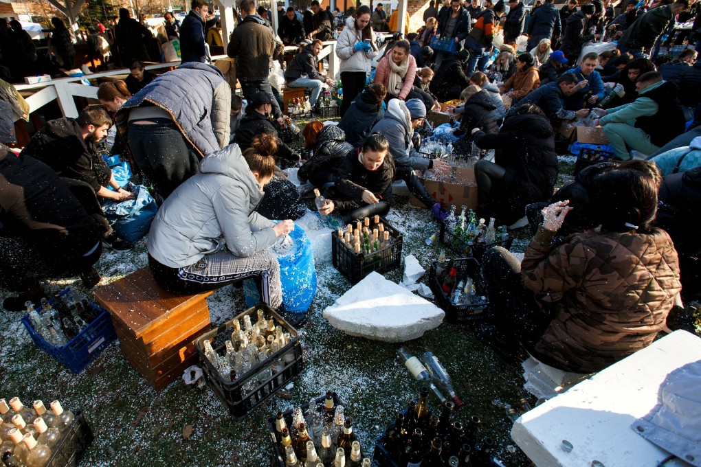 Local residents in Uzhhorod, Ukraine prepare petrol bombs to defend the city from Russian forces. Photo: Reuters