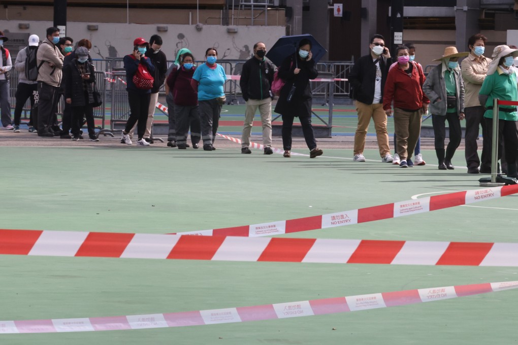 People queue for a Covid-19 test at Victoria Park mobile specimen collection station. Photo: K. Y. Cheng
