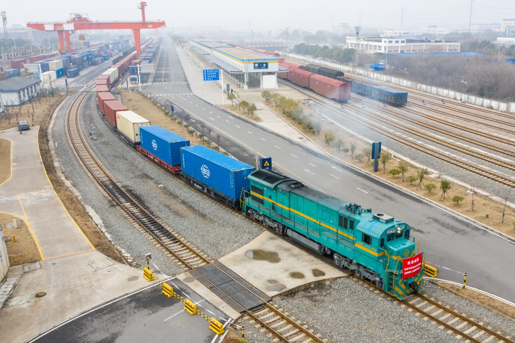 An aerial photo shows a China-Europe cargo train loaded with containers of electronic products leaving Nanjing, in eastern Jiangsu province, for
Russia’s Vorsino station on January 27, 2021. Photo: Xinhua