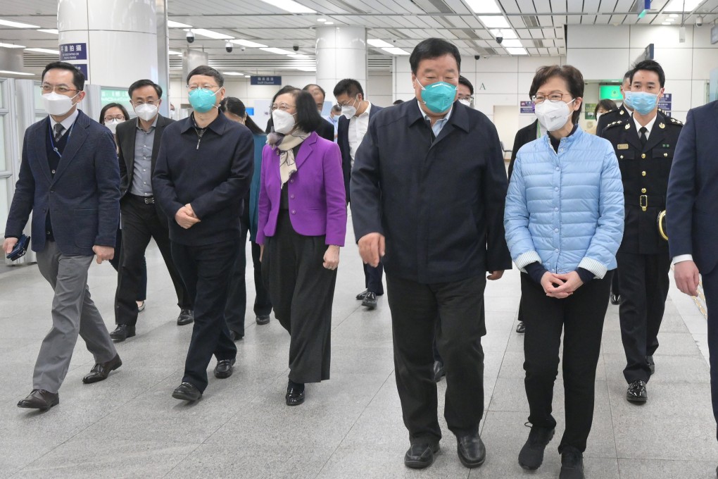 Hong Kong Chief Executive Carrie Lam with Professor Liang Wannian, head of the National Health Commission’s Covid-19 leading task force at the Shenzhen Bay Control Point. Photo: Handout
