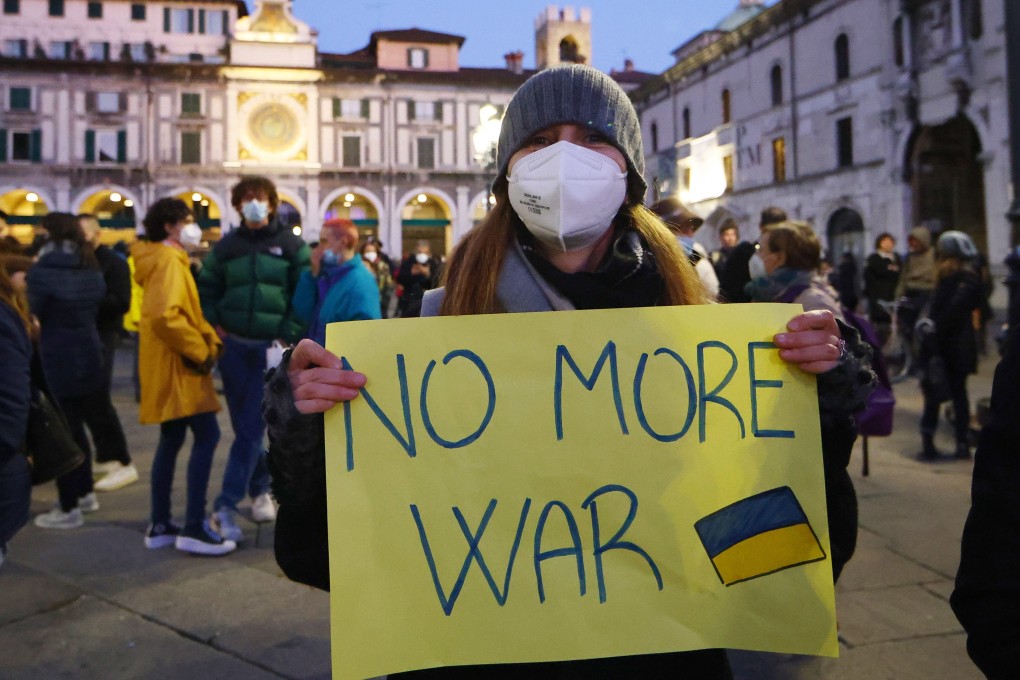 People gather in Brescia, Italy on February 28 to protest against the Russian invasion of Ukraine. Photo: EPA-EFE
