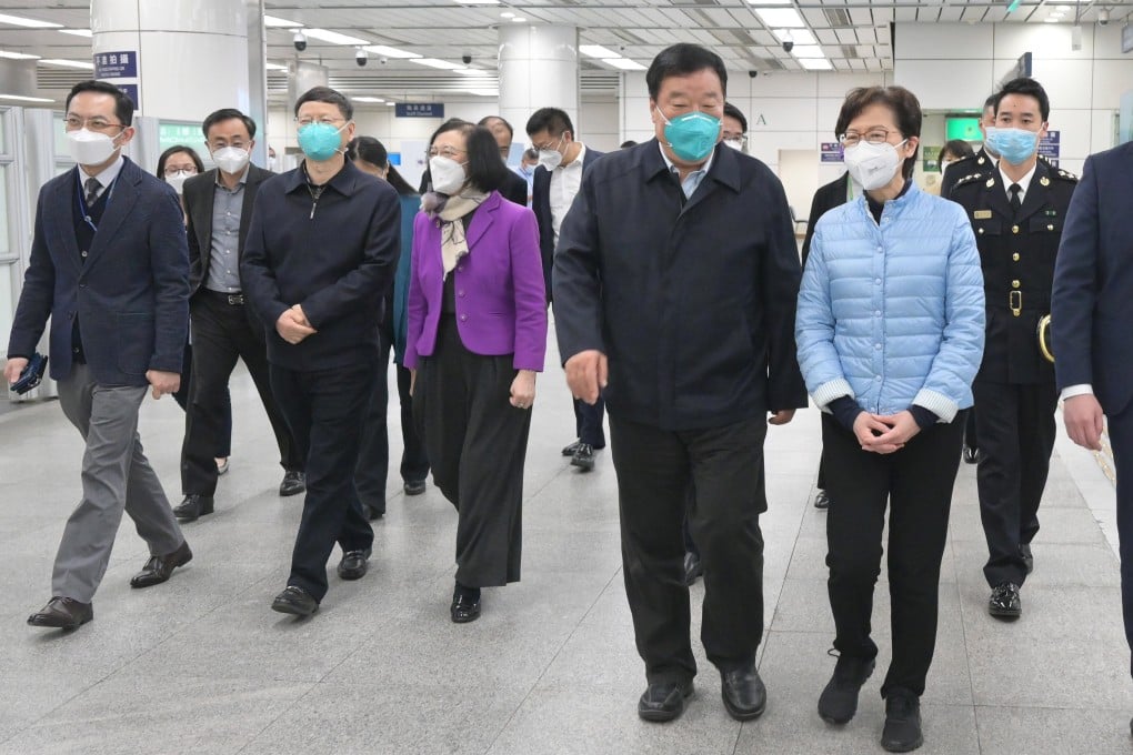 Chief Executive Carrie Lam meets mainland Chinese medical experts, including Dr Liang Wannian (to her right), in Hong Kng on Monday. Photo: SCMP Pictures