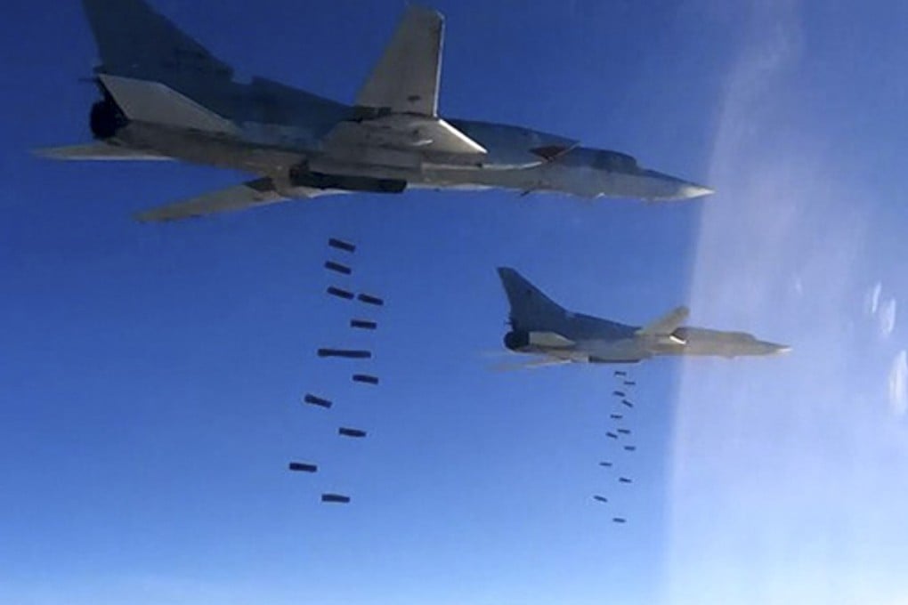 Russian Air Force Tu-22M3 planes bomb Islamic State group targets in Syria in January 2017. Photo: Russian Defence Ministry Press Service via AP