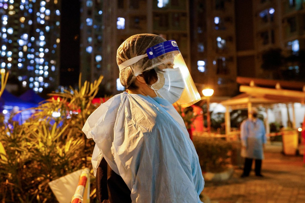 A worker wearing PPE outside a makeshift testing centre in Hong Kong as the city is braced for a lockdown. Photo: Reuters
