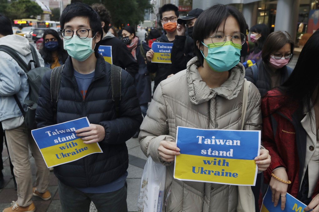 Supporters in Taiwan protest against Russia’s invasion of Ukraine in front of the Representative Office of the Moscow-Taipei Coordination Commission in Taipei on February 25. Photo: AP