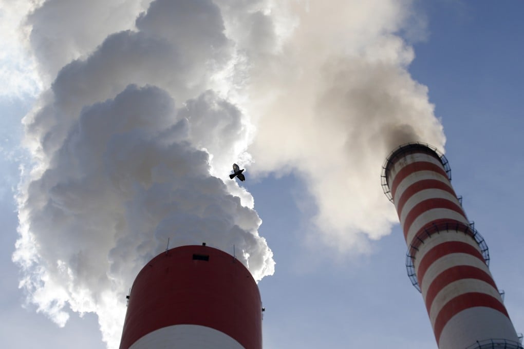 Smoke rises from the chimneys of a coal-fired power station. Southeast Asia’s SMEs emit more carbon than Cambodia and Brunei combined. Photo: AP
