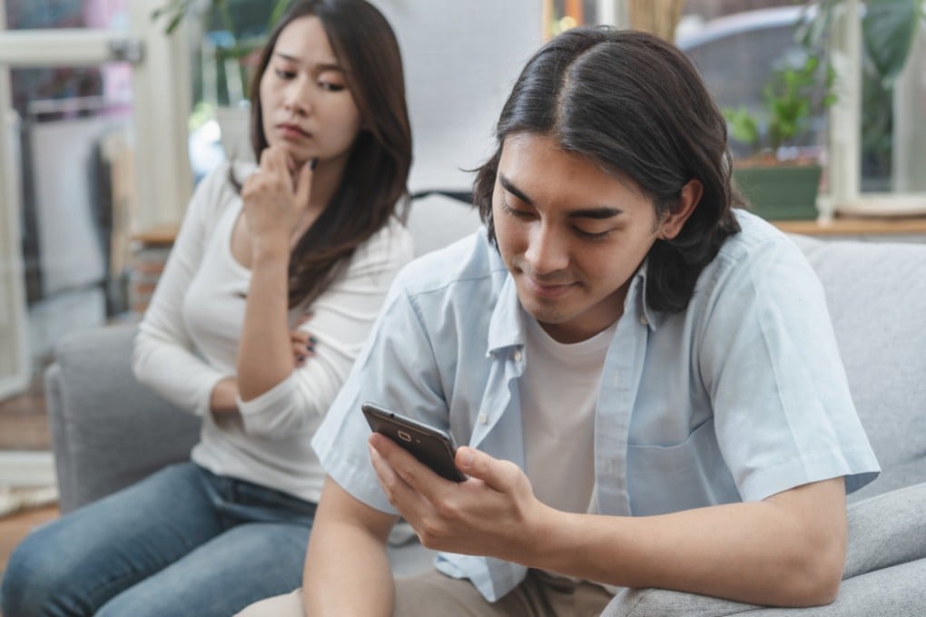 Spousal spying can range from glancing at who someone is texting to extreme cases of installing spyware and stalkerware on their phone. Photo: Shutterstock