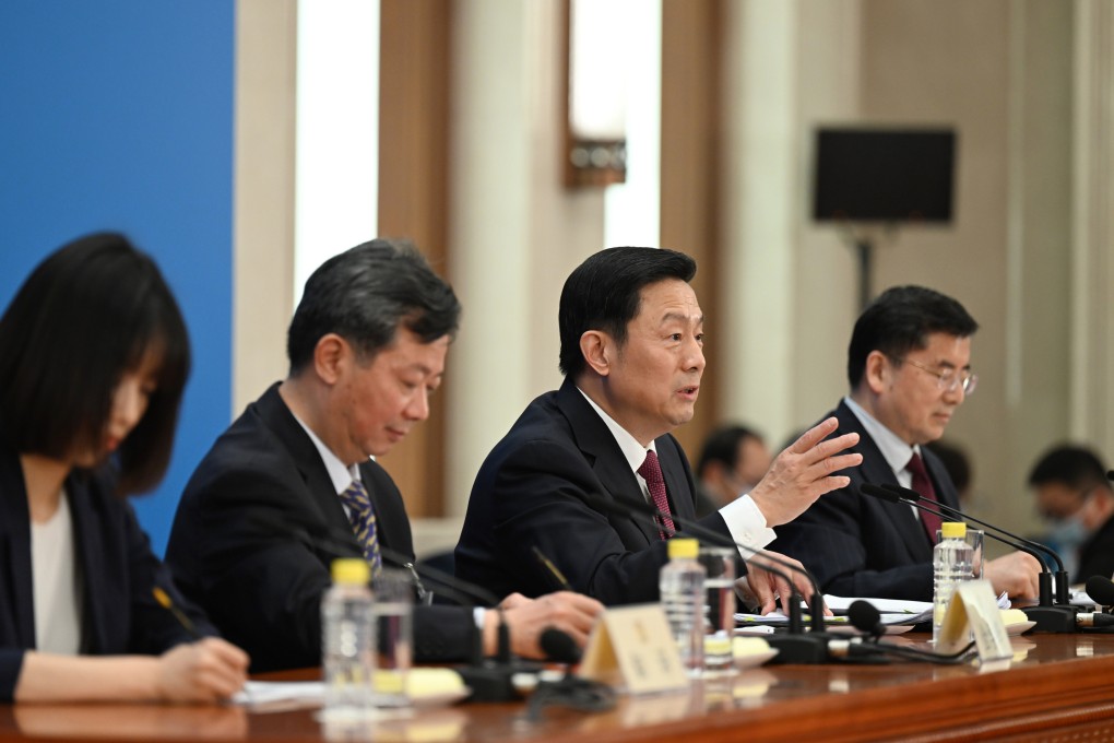 CPPCC spokesman Guo Weimin (second from right) called China’s pandemic control measures “relatively low-cost and effective”. Photo: Xinhua