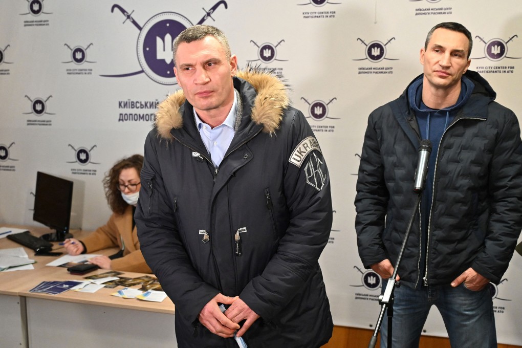 Kyiv mayor Vitali Klitschko, (left) and his brother and former Ukrainian boxer Wladimir Klitschko. Photo: AFP